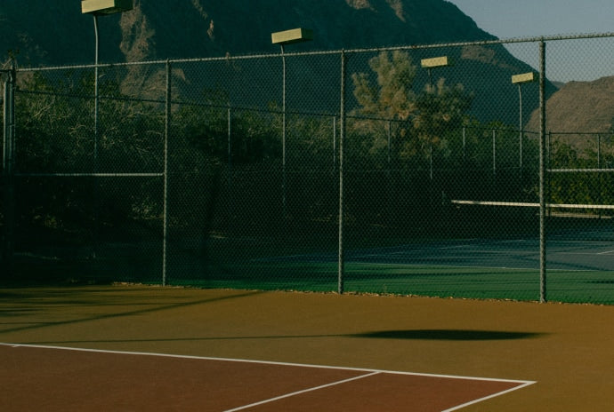 Tennis courts with mountains in the background